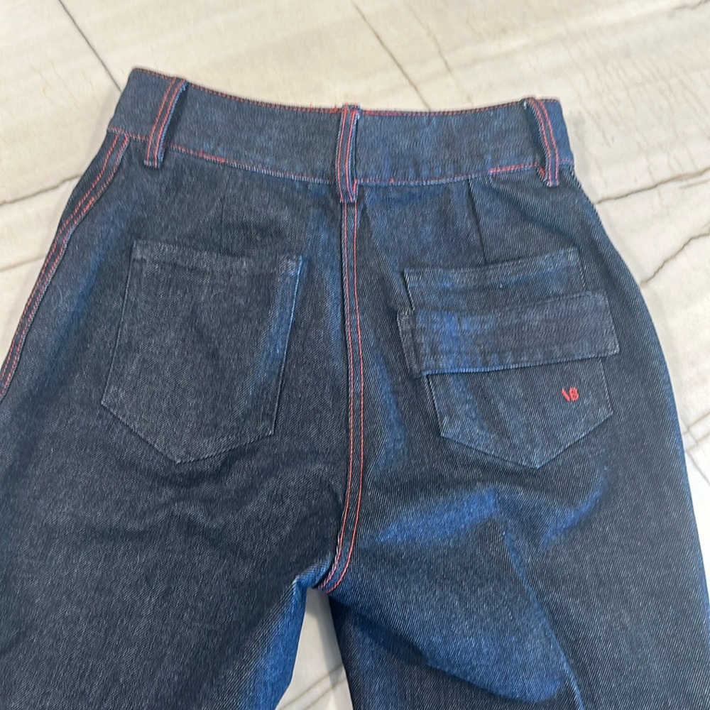 Victoria, Beckham red stitched wide leg jeans